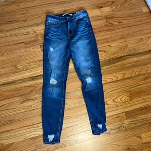 Dark blue ripped skinny jeans